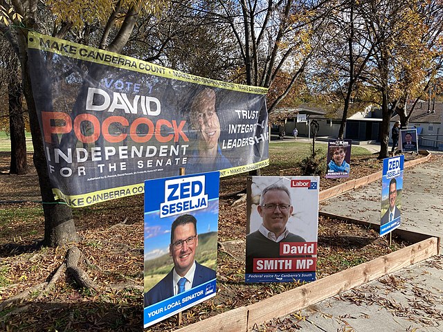 Election corflutes in a park in the ACT